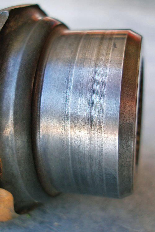 Photo 59. The rough bearing surface of the U-joint yoke has the potential to tear up a new differential oil seal.