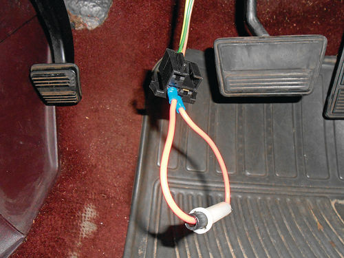 Photo 15. The jumper is used to bridge between the yellow and green wire to check the high beams.