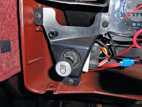 Photo 23. The headlight switch is mounted in a plastic bracket in the lower left corner.
