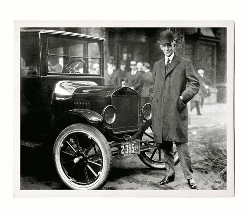 The Hilarious Hearse and (above) the man who started it all—Henry Ford with a T in 1921.