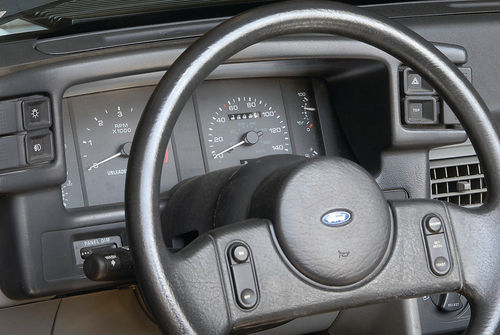 The dashboard is modern with both pluses and minuses as the 85-miles-per-hour speedometer is gone and graphics were replacing labels. Designers were apparently unable to develop a graphic synonymous with “top.”