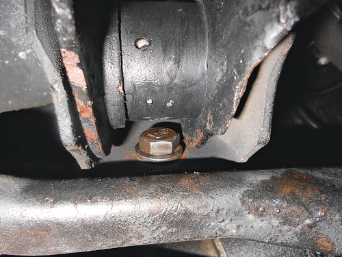 16. You are looking up at the rear lower control arm mounting and the cross brace that was removed.