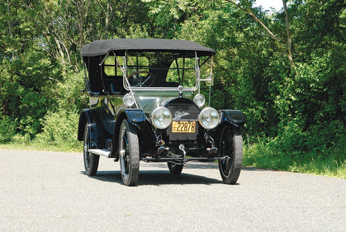 Electric lights, such as the lamps shown here, were a big step forward from the gas and kerosene units of the time. They were part of the Delco electrical system that included a self-starter.