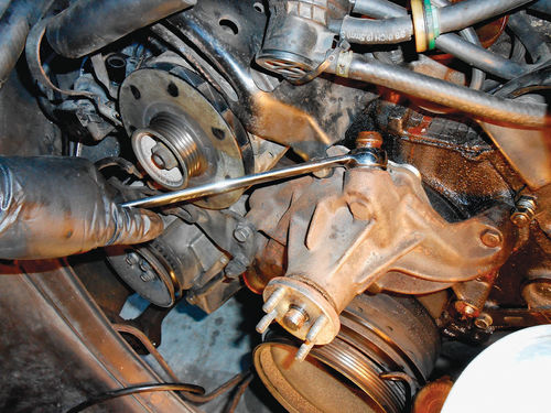 32. The time to remove the hose fitting from the water pump is now, so a 7 ⁄8