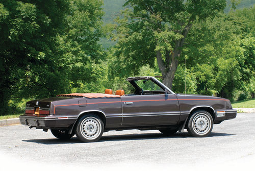 Putting the top down then short drive of my LeBaron 