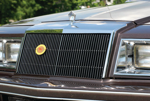 A crystal version of the Chrysler corporate symbol serves as the hood ornament and provides the front end’s only identification.