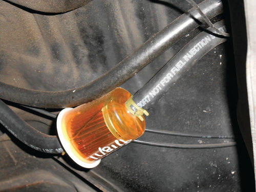 Photo 23. A digital camera was used to zoom in and examine these fuel hoses without crawling under the vehicle.