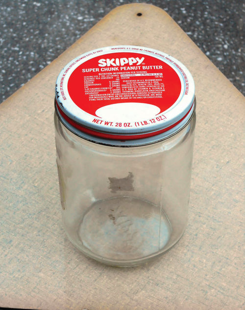 Photo 60. A glass jar with a metal lid will be turned into a vacuum reservoir to remove fluids.