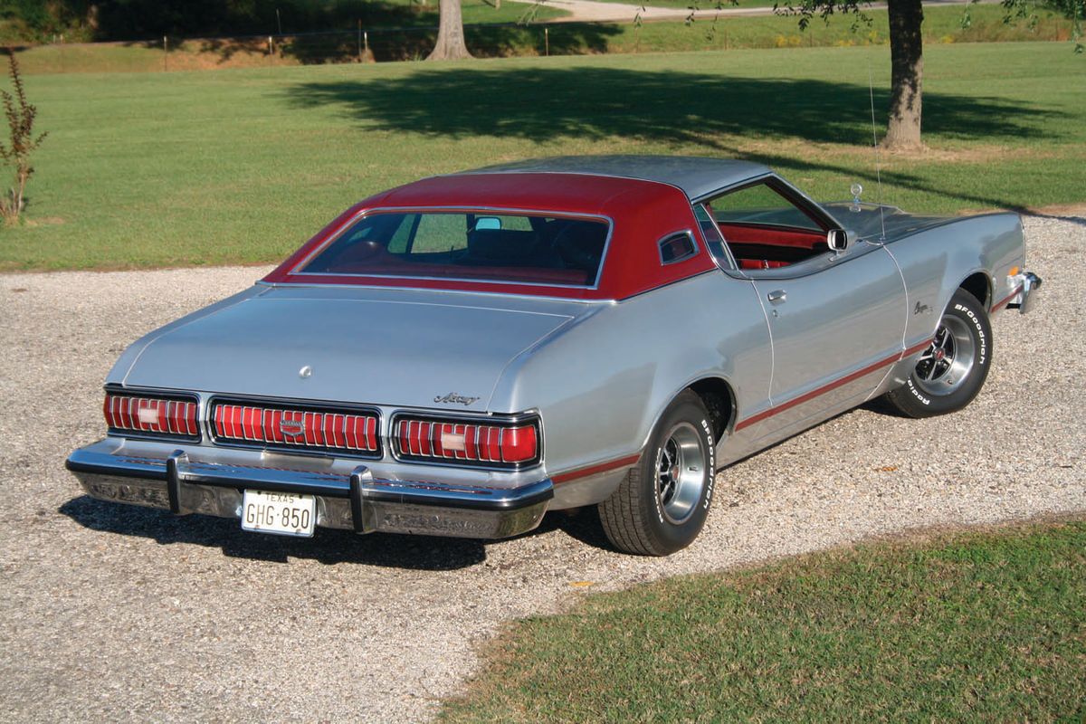 The landau-style vinyl-covered roof with opera windows was standard issue. A full vinyl roof was optional.