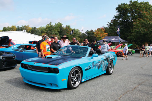 Richard poses with owners of Petty-built highperformance cars