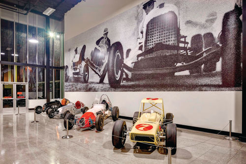 Midget cars on display.