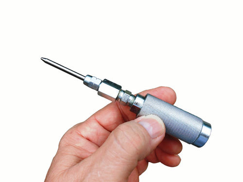 A long grease gun extension needle will get to places the normal fitting coupler won’t reach.