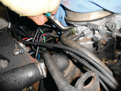 Photo 11. Disconnect the PCV hose from the front of the throttle body, and then remove and inspect it.