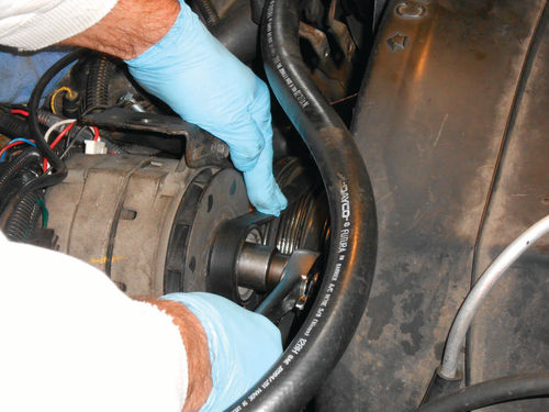 Photo 5. Rotating the engine using the alternator is easy with the spark plugs removed.