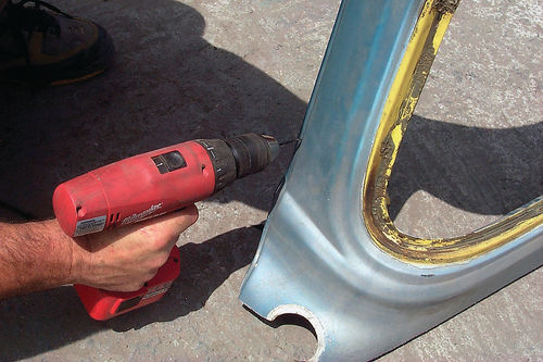 To free the sheet metal from the B pillars, drill out the spot welds with a small bit.