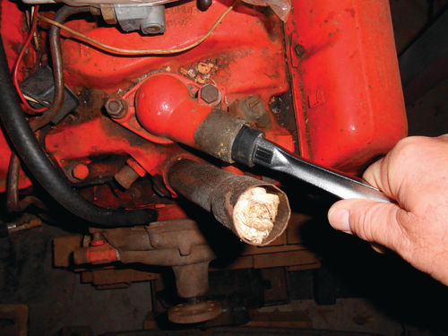 Ratchet handle with a piece of rubber hose on it