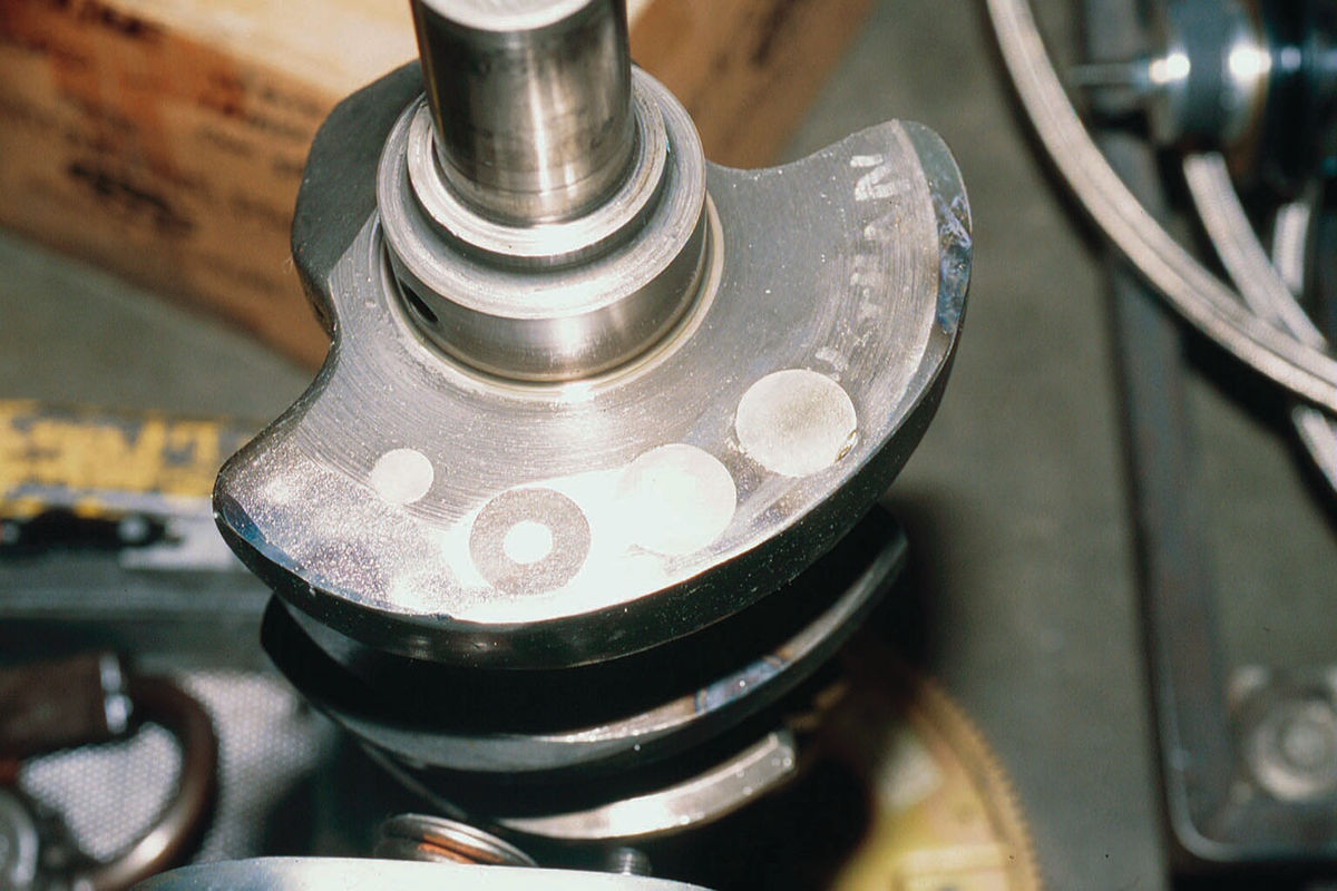 Plugs added to a light crankshaft counter balance weight.