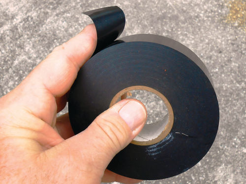 This may look like ordinary electrical tape, but it has no adhesive, like the OE stuff.