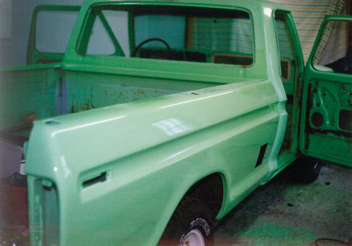 Mint green Ford F-100 being restored