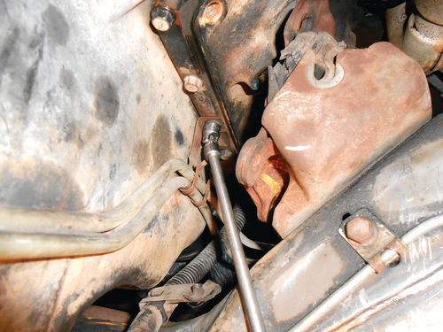 The bracket for the transmission cooling lines was removed to increase the space.