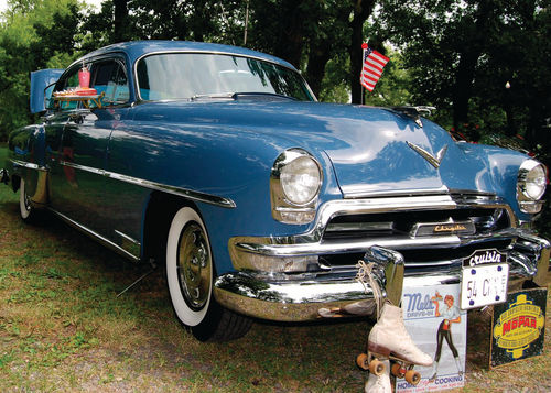 The Flagship Blue paint on this 1954 Chrysler New Yorker always draws attention.