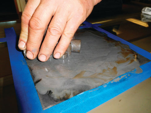 After removing deep scratches caused by debris with 240-grit black sandpaper, repeat the procedure using 600-grit paper to remove sanding scratches.