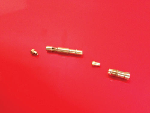 The emulsion tube components are (left to right), the Retaining Sleeve, Air Correction Jet, Mixing Tube and Main Fuel Jet.