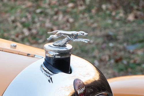 Radiator caps have ranged from simple to ridiculous. The Whippet’s cap suggests speed and does so with style.