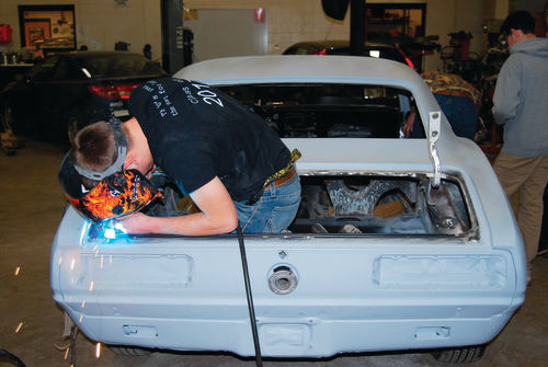 Mason does some additional welding in the Camaro’s trunk. He said he grew up on a farm and learned to weld when he was a boy.