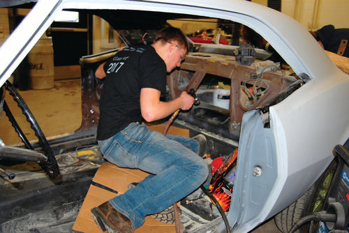 Mason Winter preps for some welding on the panel seams at the rear bulkhead.