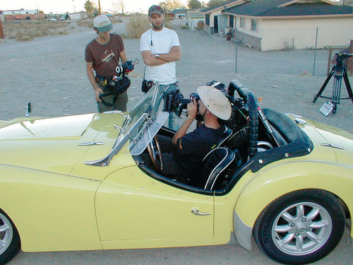 The young film crew at times was perplexed by the vintage sports car.