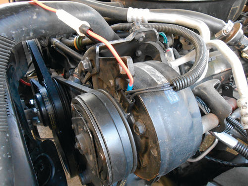 A heavy gauge test lead is connected between the battery positive terminal and the clutch connector.