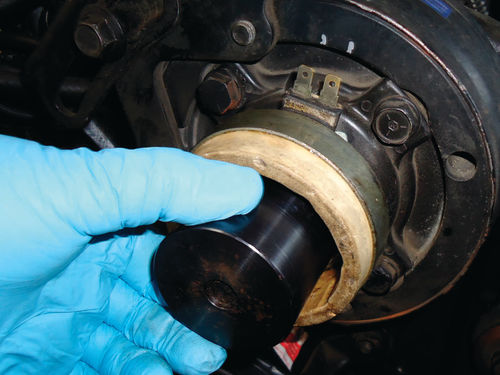 A combination of two special drive bushings gives the needed depth to install the coil safely.