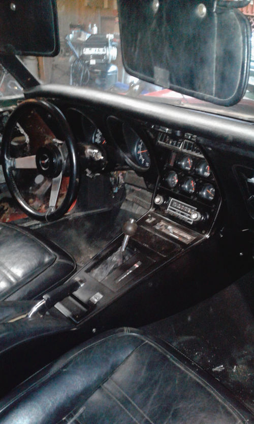 The original black interior was in pretty good shape and was reinstalled for the time being.