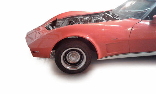 Correct Corvette wheels were back on the car and the bright metal trim was buffed up.