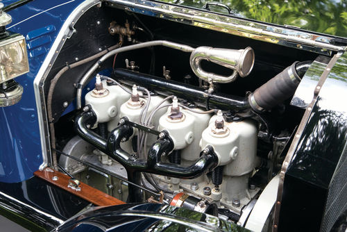 The T-head four-cylinder displaces 298 cubic inches and produces 40 brake horsepower.