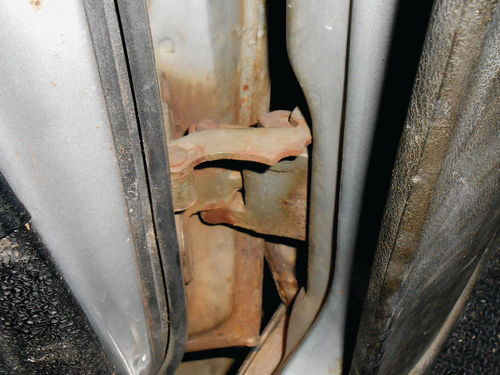 2. Here is the neglected lower driver’s door hinge on my ’66 Malibu. It’s nothing at all like the modern version.