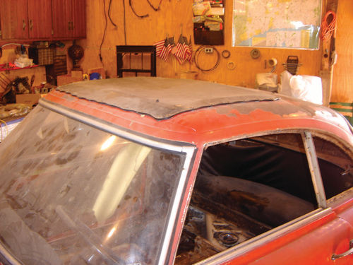 An aftermarket sunroof and signs of an earlier yellow paint job hold the possibility of an interesting history for this car.