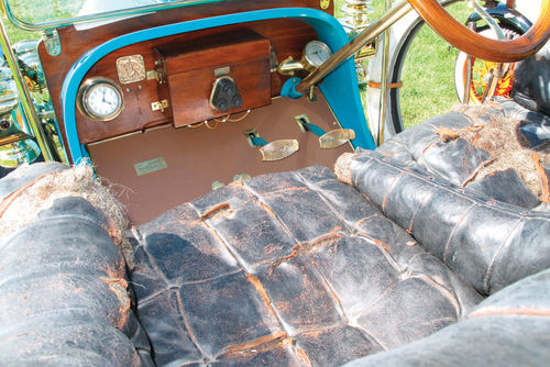The leather upholstery is original—and showing its age.