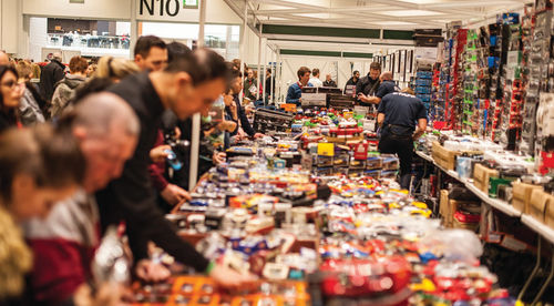 A large display of model cars brought in a crowd of eager shoppers.