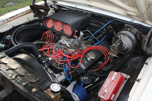 The original Y-code 390 2-bbl. was rebuilt including a .030 overbore and a Holley 770 Street Avenger four-venturi carburetor. James cut a hole in the hood to give clearance for the air intake mounted atop the carburetor.