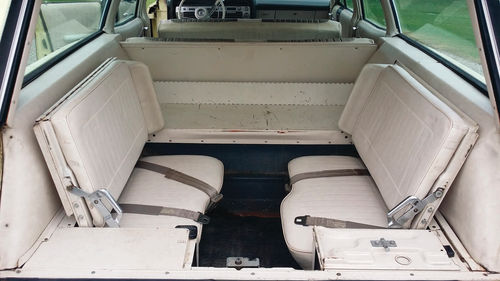 The dual-facing rear seats made this Country Squire a nine-passenger model. When not in use they could be folded down for additional cargo space.