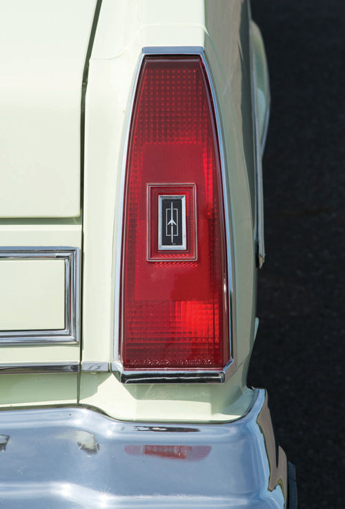 The rocket in the taillight lens is a direct tie to Oldsmobile’s first modern V-8, the Rocket of 1949.