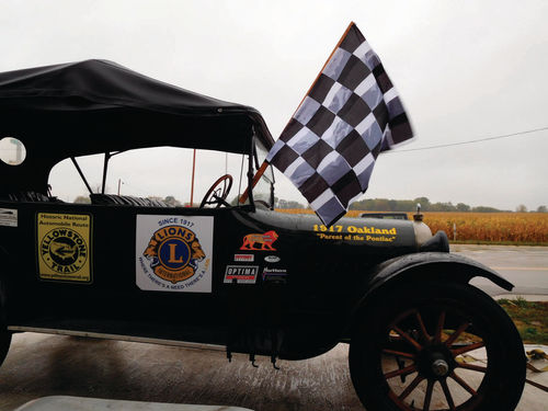 A checkered flag waves over the Oakland’s hood as we completed our tour.