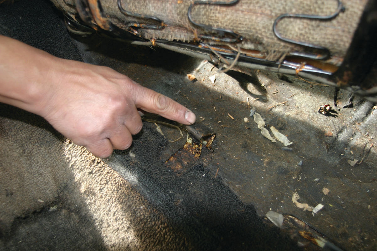 The backseat cushion is held in by clips