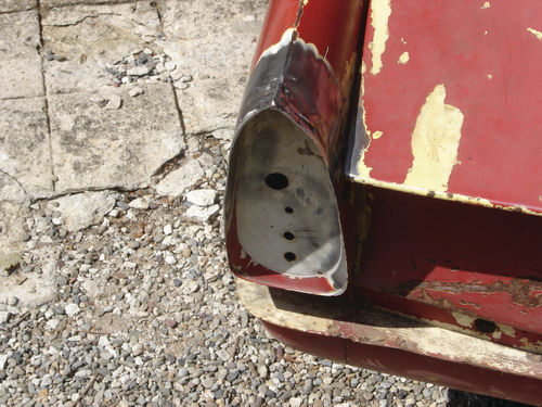 The end of the left fin straightened out after some hammer work and welding.