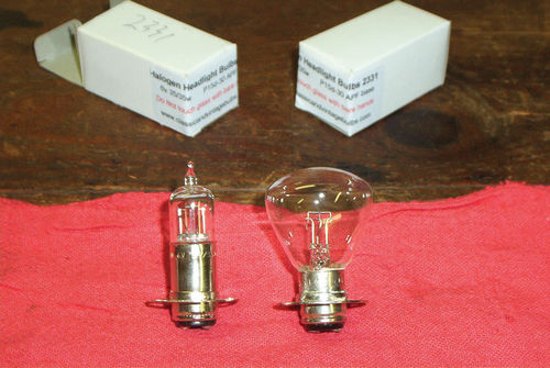 Comparing the sides: Here you see the differences in the shape of the bulbs…a halogen H2331 bulb on the left and Mazda 2331 bulb on the right.