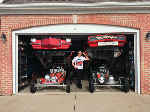 Bill Porterfield with his 1970 Camaro funny car on the left and the ’68 to the right.