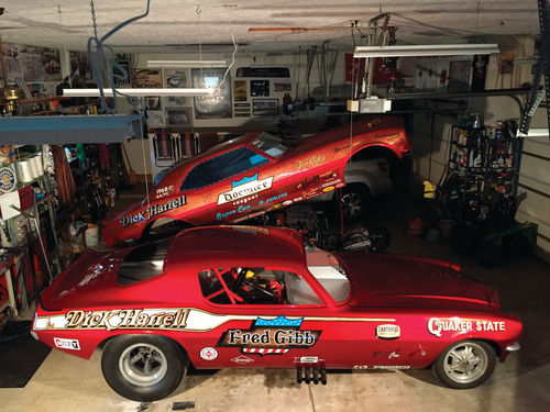 The two vintage racers are sideby-side in the shop with the ’70 in front and the ’68 in the background.