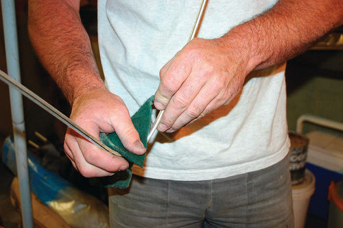 Clean and polish the molding that goes around the windshield.